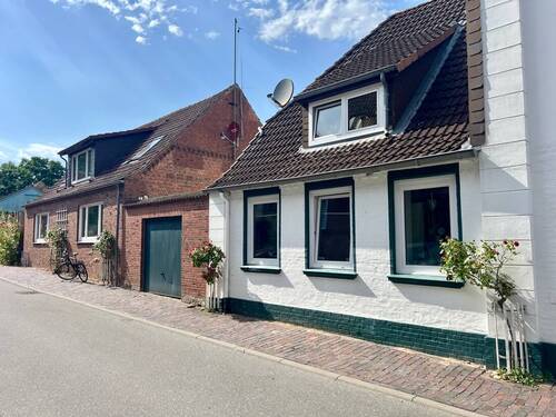 Außenansicht - 1 Zimmer Mehrfamilienhaus, Wohnhaus zum Kaufen in Wöhrden