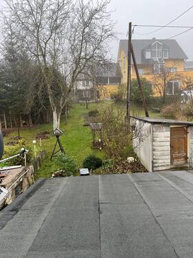 Blick in den Garten - Einfamilienhaus zum Kaufen in Oberweißbach/Thüringer Wald