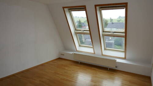 Wohnzimmer - Gemütliche 4-Raum-Dachgeschosswohnung in toller Ortslage von Gelenau!