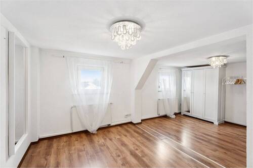 Zimmer im Dachgeschoss - 