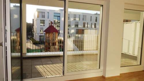  Wohnküche mit Süd-West Terrasse - 