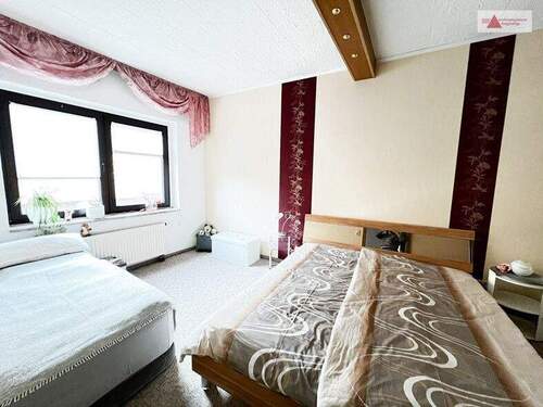 Schlafzimmer Einliegerwohnung 1.OG - 