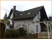 Bild 1 - Ein Doppelhaus - 2 Gesichter - Übergroßes Grundstück mit Carport in BSS-Eckardroth