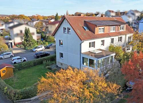 Rückansicht des Hauses - Sofort verfügbar: Großzügige Doppelhaushälfte in zentraler Lage am Philosophenwald - vielseitig nutzbar mit Potenzial