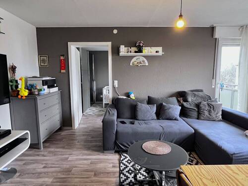 Wohnzimmer - Helle 2-Zimmer-Wohnung mit Balkon - Gemütlich Wohnen in Rastatt!