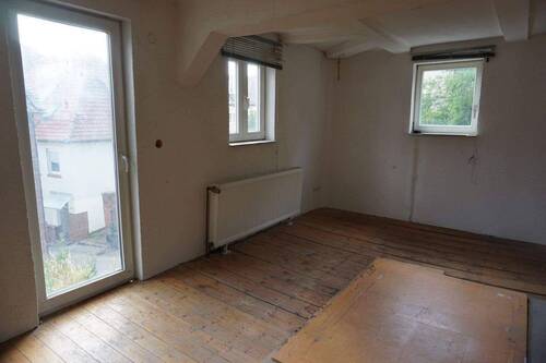 Wohnzimmer EG.JPG - 7 Zimmer Mehrfamilienhaus, Wohnhaus in Homberg