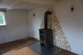 Ofen Wohnzimmer EG.JPG - Mehrfamilienhaus, Wohnhaus mit 150,80 m&sup2; in Homberg zum Kaufen
