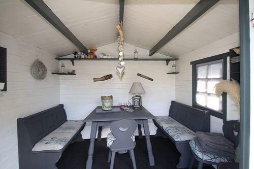 Das Gartenhaus mit Sitzbereich - 