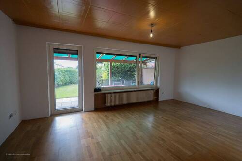 Wohnzimmer - Reihenendhaus mit 88,70 m&sup2; in Unterhaching zum Kaufen