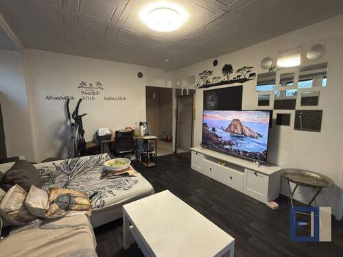 Wohnzimmer - 2 Zimmer Etagenwohnung zum Kaufen in Ginsheim-Gustavsburg / Gustavsburg