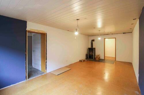 Wohnzimmer - Einfamilienhaus mit 170,00 m² in Kirchhain zum Kaufen