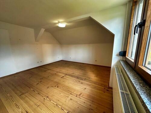 Zimmer im Dachgeschoss - 