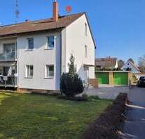 Vermietete Doppelhaushälfte mit großem Garten als solides Investment - Rüsselsheim