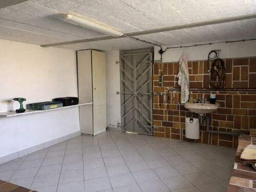 Raum für Werkstatt und Lagerung - 