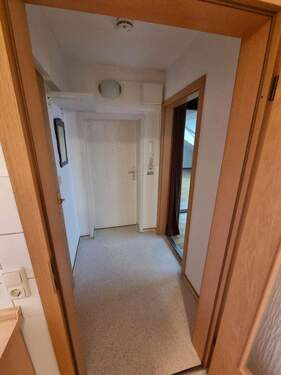 Flur Wohnung Blickwinkel Küche - Etagenwohnung mit 28,00 m² in Seevetal zur Miete