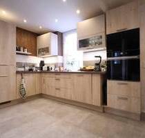 Großzügiges Reihenmittelhaus mit Einliegerwohnung und Garten-Oase - Aschersleben