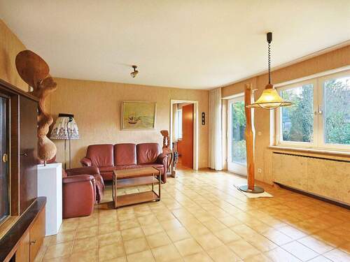 Gemütlicher Wohnbereich im Erdgeschoss mit Zugang zum Garten - 