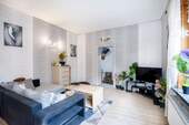 Wohnzimmer - 5 Zimmer Einfamilienhaus zum Kaufen in Todenbüttel