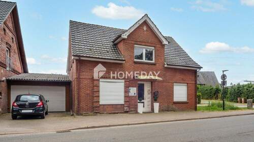 Außenansicht 2 - Charmantes Einfamilienhaus mit großem Grundstück und viel Platz zum Wohlfühlen