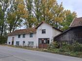 Blick auf Haus von Straße aus - 5 Zimmer Einfamilienhaus zum Kaufen in Roßbach