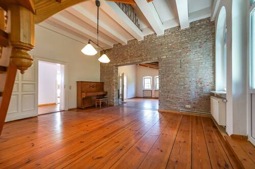 Wohnbereich mit Blick in Zimmer 1 - 