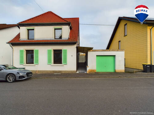 RE/MAX Immobilien DeLux - 