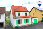 RE/MAX Immobilien DeLux - Charmantes Einfamilienhaus - 159.000,00 EUR Kaufpreis, ca.  120,00 m² Wohnfläche
