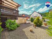 RE/MAX Immobilien DeLux Haus Saarhölzbach Außenansicht - 