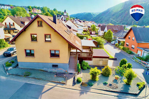 RE/MAX Immobilien DeLux Haus Saarhölzbach Außenansicht - 