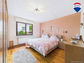 RE/MAX Immobilien DeLux Einfamilienhaus Mettlach/Saarhölzbach Schlafzimmer - 