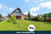 Gartenansicht - Großes Familiendomizil in Rudow: Potenzial für zwei Parteien, Keller & Garten