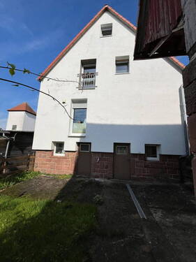 Hausansicht vom Garten - Einfamilienhaus mit 137,80 m&sup2; in Kirchhain zum Kaufen