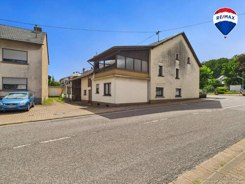 RE/MAX Immobilien DeLux Haus in Losheim am See/ Bachem - 