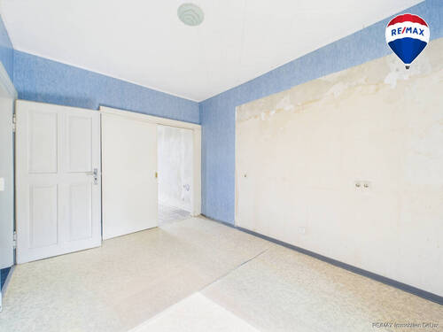 RE/MAX Immobilien DeLux Haus Mettlach Zimmer OG - 