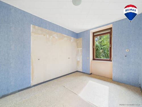 RE/MAX Immobilien DeLux Haus Mettlach Zimmer OG - 