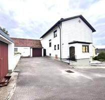 Charmantes Einfamilienhaus mit großem Grundstück und Ausbaupotenzial in Wolnzach!