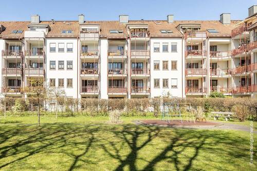 Die Rückseite der Wohnanlage - Etagenwohnung mit 52,80 m&sup2; in München zum Kaufen