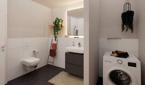 Ein modern gefliestes Badezimmer - Etagenwohnung mit 71,50 m² in Hasloh zum Kaufen