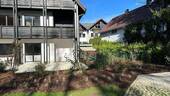 Hausansicht und Terrasse - 2 Zimmer Etagenwohnung zum Kaufen in München