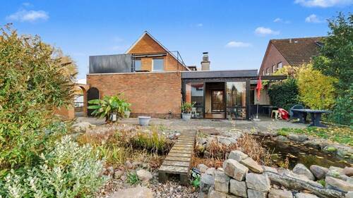 Ansicht Anbau und Wintergarten - Einfamilienhaus mit 237,00 m&sup2; in Nienburg zum Kaufen