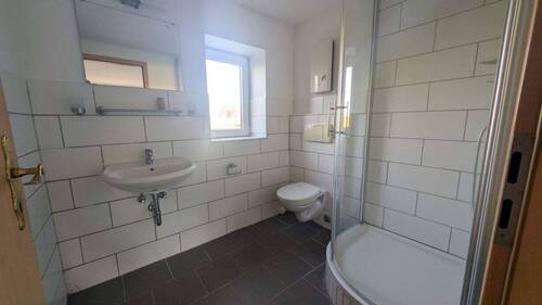 Badezimmer in Wohnung 1 im EG - 