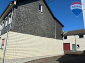 3. Haus Einfahrt - Doppelhaushälfte mit 99,80 m² in Charlottenberg zum Kaufen