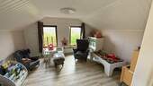 Zimmer im Dachgeschoss - 