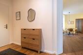 02 Weinbergsweg_Flur_Schuhschrank_Durchblick_Esszimmer.jpg - 