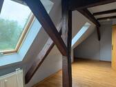 Dachgeschoss mit Holzbalken - 