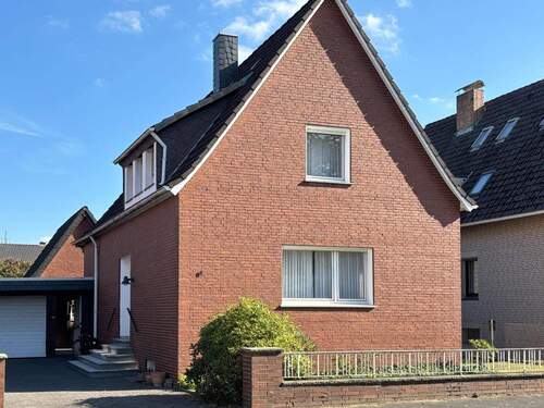 Straßenansicht - Einfamilienhaus mit 100,00 m&sup2; in Gütersloh zum Kaufen