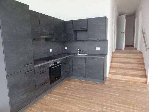 Kochbereich mit Einbauküche - 