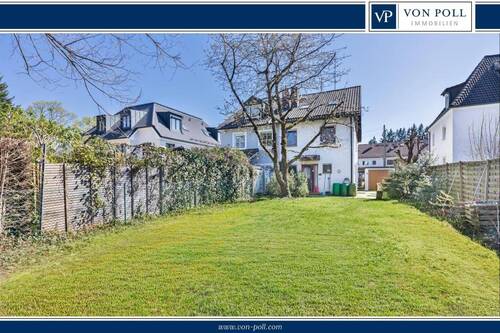 Titelbild - Wohnen mit Freiraum: Doppelhaushälfte mit weitläufigem Garten in ruhiger Lage