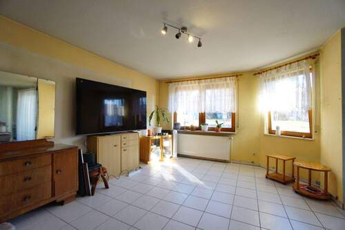 Helles Wohnzimmer - Einfamilienhaus mit 129,00 m&sup2; in Kirchentellinsfurt zum Kaufen