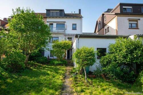 Rückansicht vom Garten - 1 Zimmer Mehrfamilienhaus, Wohnhaus in Saarbrücken / Gersweiler